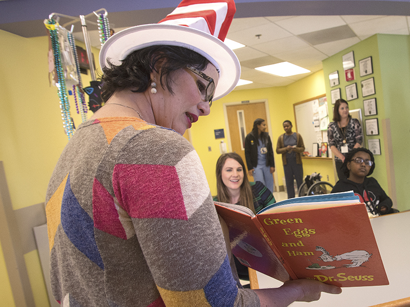   Hospital school teacher Pam Parks-McCord reads "Green Eggs and Ham" to Batson Children's Hospital patients as a celebration of Dr. Seuss' birthday. The beloved children's author was born March 2, 1904.